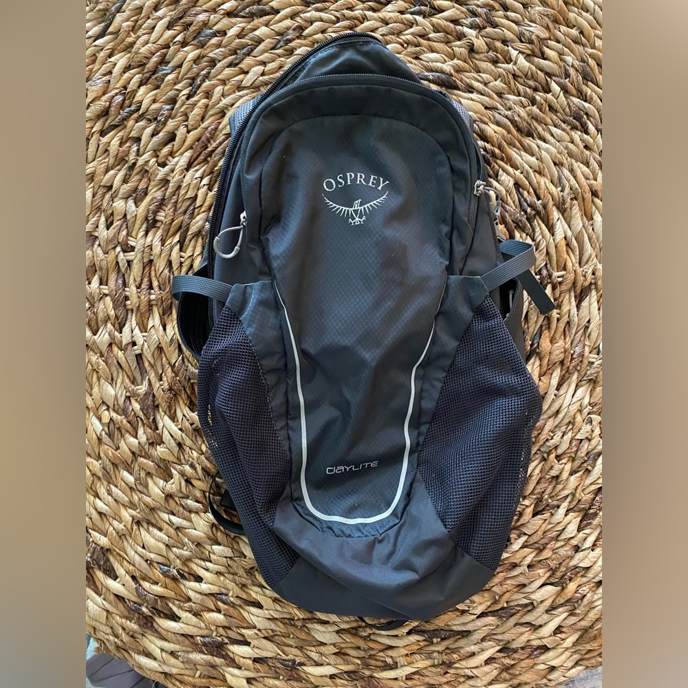 Osprey Daylite pack. Perfect for a day trip. Made of water wicking material.